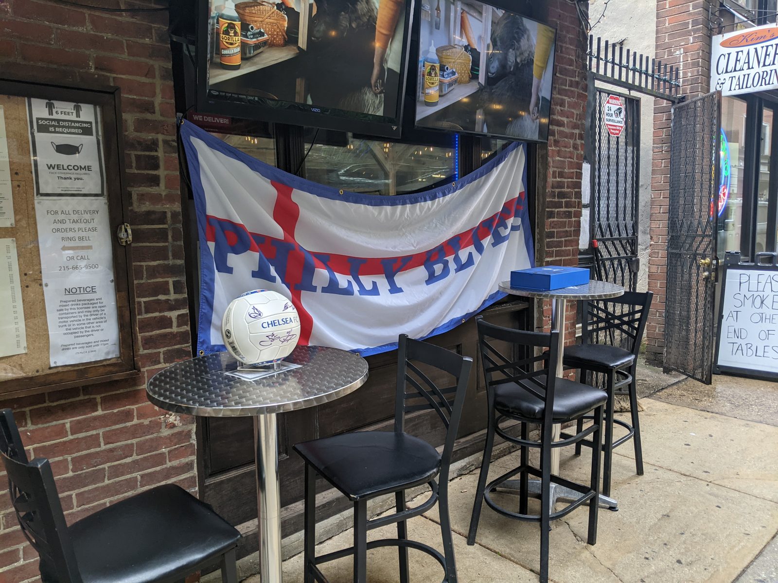 Philly Blues banner hung outside Cavanaugh's with a signed Chelsea ball on a table